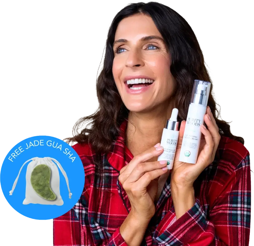 Smiling woman in a red plaid shirt holding two AURORAS skincare products—one dropper bottle and one pump bottle. A circular graphic beside her reads "FREE JADE GUA SHA" and shows a green gua sha tool in a white drawstring pouch.